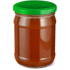 Apple jam in a transparent glass jar on a white background.