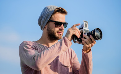 Because every picture tells a story. capture adventure. journalist. travel with camera. male fashion style. looking trendy. macho man with camera. sexy man touristic reporter. photographer in glasses