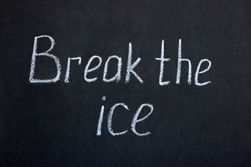 
The inscription on the chalk board "break the ice". Positive lettering