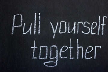 Obraz premium White chalk lettering pull yourself together. Encouraging inscription