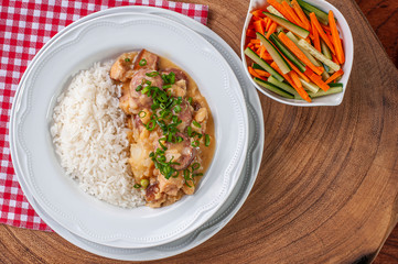 .Puchero. Dish made with white beans, chickpeas, sausage, bacon and vegetables. Dish of Spanish origin very common in Brazil and South America. Top view.
