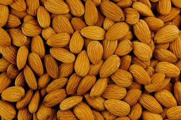 Almond background texture. Fresh raw organic snacks.