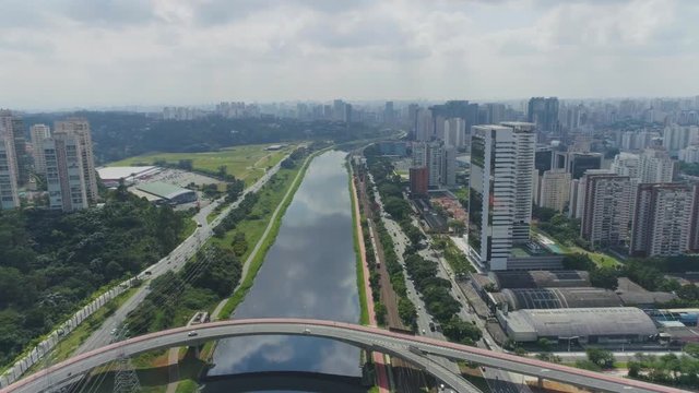 Panoramic view of city life scene in the sunny day. Marginal Pinheiros Highway, Sao Paulo, Brazil. Cityscape scenery. Great landscape
