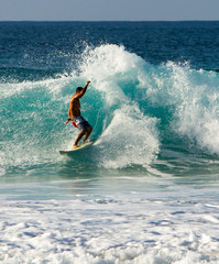 Surfing on the north shore, Oahu, Hawaii