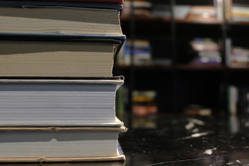 stack of old book in library concept