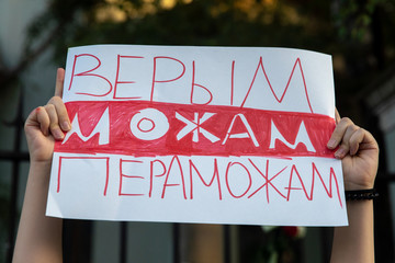 Protests in Belarus after the presidential elections.   Poster in the hands. Translation 