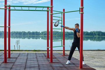 a boxer does training sessions in the morning on the sports field