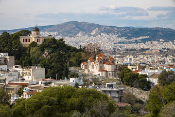 Fototapeta na wymiar View over Athens featuring the Agia Marina, Greece