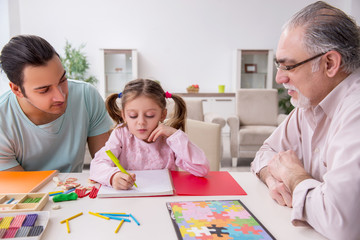 Fototapeta premium Three generations of family in early development concept