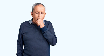 Senior handsome man wearing casual polo feeling unwell and coughing as symptom for cold or bronchitis. health care concept.