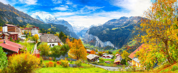 Stunning autumn view of picturesque alpine village Wengen