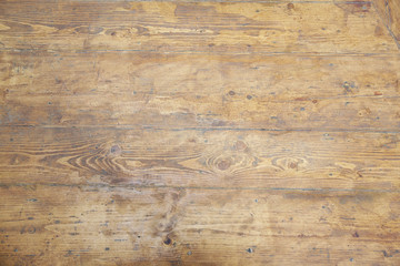 the floor is made of light colored wooden planks