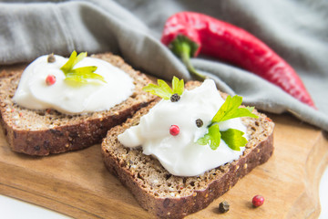 Delicious bread with spices, chili peppers, herbs and cheese cream