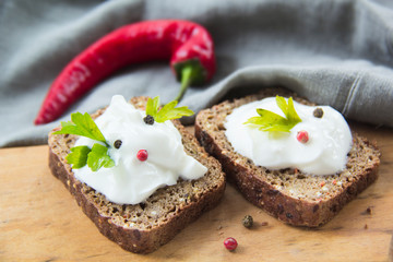 Delicious bread with spices, chili peppers, herbs and cheese cream