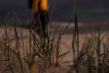 unrecognized man in the sand