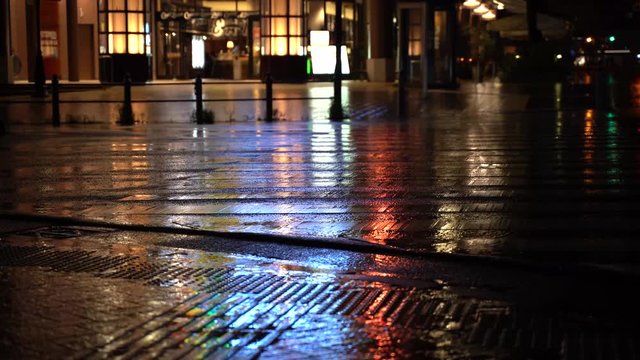 Wet pedestrian crossing on a rainy night