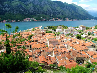 Aerial view of Kotor bay and old city in Kotor, Montenegro. Kotor is a coastal town in a secluded Gulf of Kotor, its preserved medieval old town is an UNESCO World Heritage Site. 