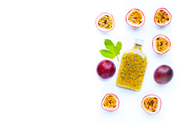 Passion fruit juice on white background. Copy space