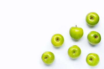 Fresh green apples on white background.