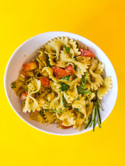 pasta bowl with herbs and tomatoes