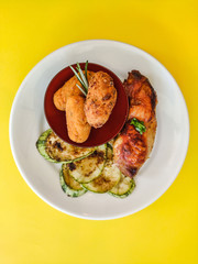 Roasted chicken corn balls and grilled zucchini meal