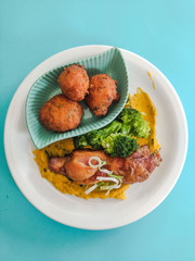 roasted chicken rice balls broccoli and pumpkin