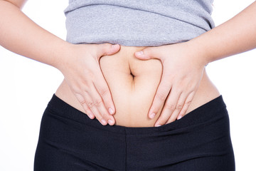 Fat woman holding excessive fat belly, overweight fatty belly isolated on over white background. Diet lifestyle, weight loss, stomach muscle, healthy concept.