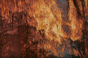 Grunge metal texture with vintage orange paint and rust