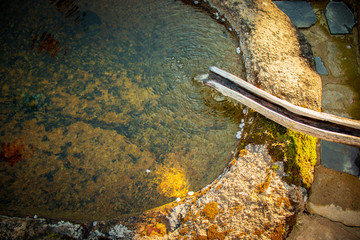 Clear spring water in Buddhist temple.