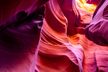 Lower Antelope Canyon in Page Arizona with natural landscapes of water washed bright sandstones...