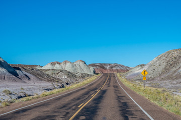 A long way down the road of Petrified Forest National Park, Arizona