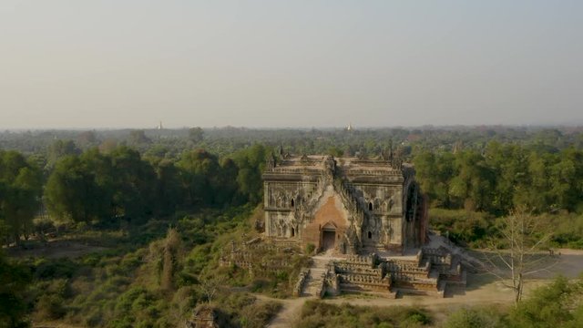 Landscape drone shot of the ancient ruins of Lay Htat Gyi Temple in Inn Inn Wa, Mandalay, Myanmar (Burma).