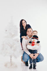 family at the Christmas tree. woman and child isolated on a white background. new year celebration.