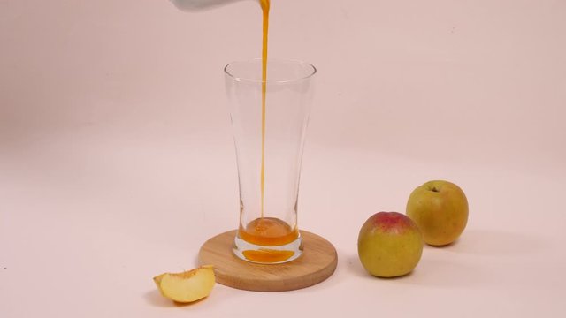 Making cold peach compote ade for summer drink. Making homemade fresh peach juice. Process of making a lemonades