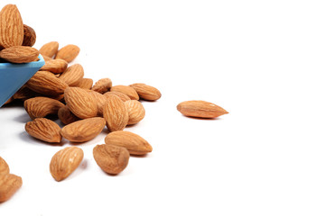 Group of almonds isolated on white.