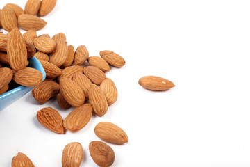 Group of almonds isolated on white.