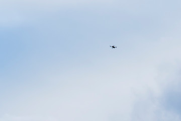 A drone flying in the evening sky