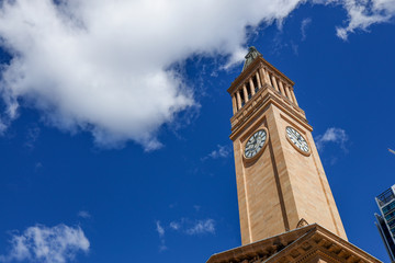 Fototapeta na wymiar The clock tower at the Brisbane City Hall of Australia 