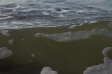 Waves breaking on a remote surf beach, New Zealand. 