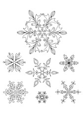 Set of snowflakes. Hand drawn illustration for adult coloring page.