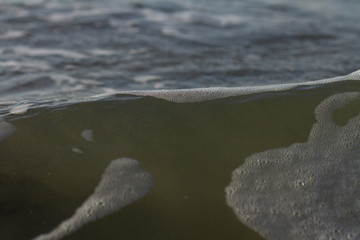 Waves breaking on a remote surf beach, New Zealand. 