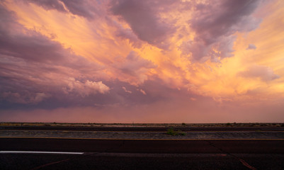 Dust storm cloud, also known as a desert haboob, moving across the horizon during a monsoon thunderstorm