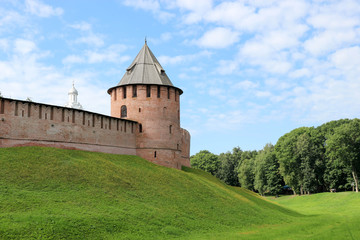 Fototapeta na wymiar View to fedorov tower of the Velikiy (Great) Novgorod citadel (kremlin, detinets) in Russia under blue summer sky in the morning 