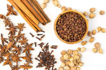 Assorted colorful spices on a white background. Healthy diet lifestyle.