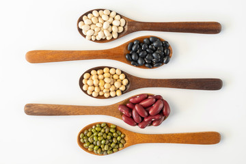 Collection of whole grains seeds isolated on white background. Healthy diet raw ingredients.