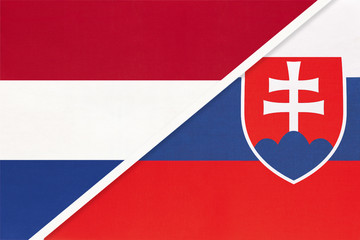 Fototapeta premium Netherlands or Holland and Slovakia, symbol of national flags from textile. Championship between two countries.