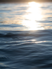 Small waves breaking on a surf beach, New Zealand. 