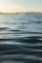 Small waves breaking on a surf beach, New Zealand. 