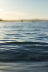 Small waves breaking on a surf beach, New Zealand. 