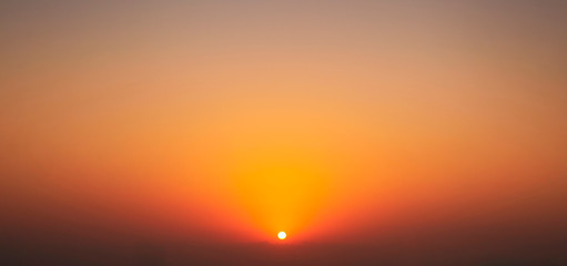 Fiery red sunset over the sea. Tranquil landscape